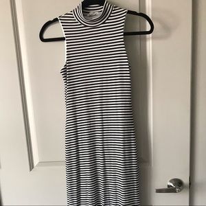 Form fitting striped floor length maxi dress